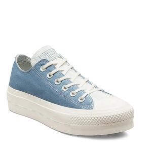 Women’s blue and white platform converse